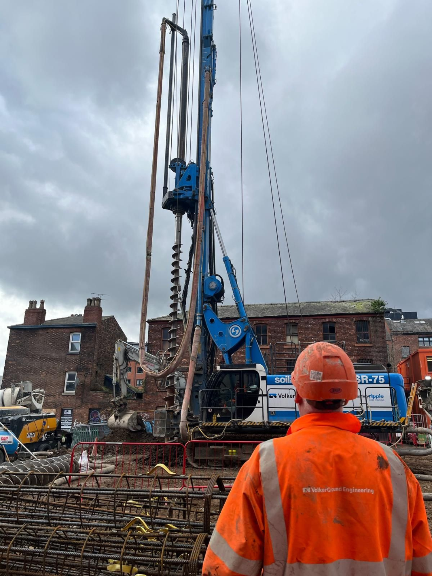 VolkerGround Engineering employee on site with piling rig