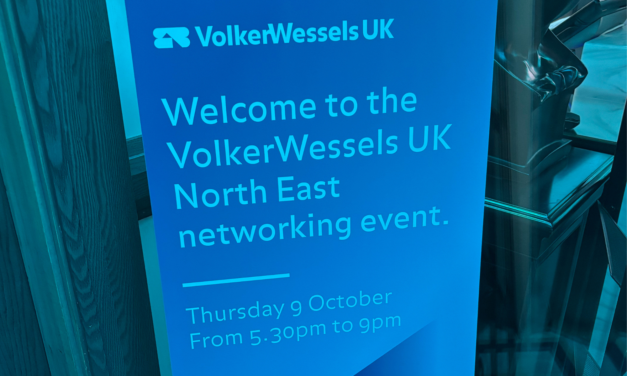 Welcome sign in blue that says Welcome to the VolkerWessels UK North East networking event